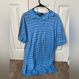 Men’s Ralph Lauren Polo size large, gently worn. Light blue with yellow horse.